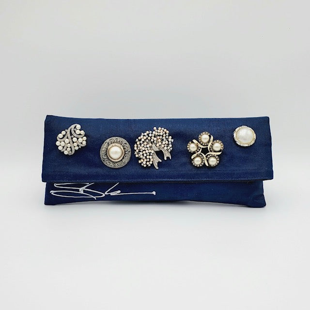 Solid with Pearl and Silver Cluster